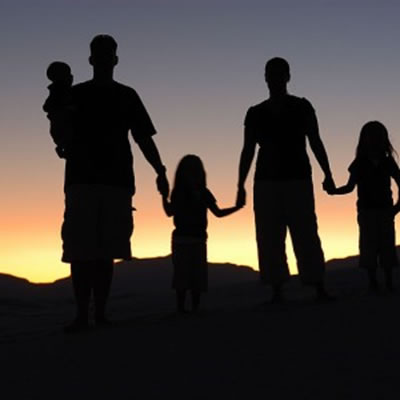 Family watches sunrise